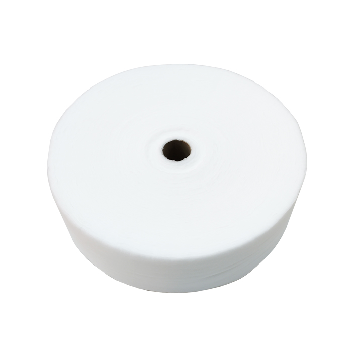 Hot air through adl nonwoven