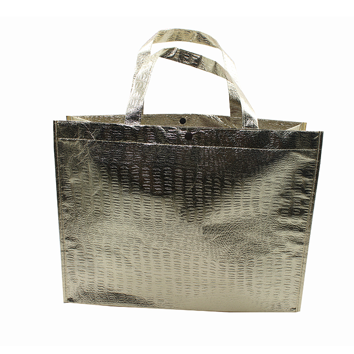 Foldable nonwoven bag