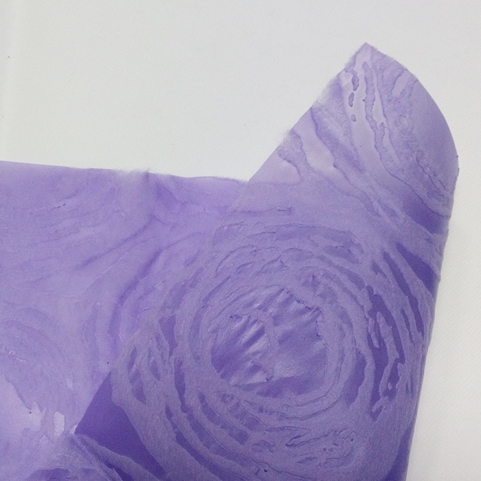 Nonwoven flower wrapping paper