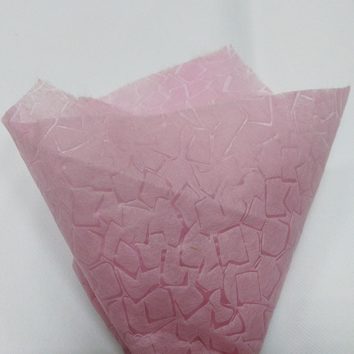 Nonwoven clothing wrapping paper