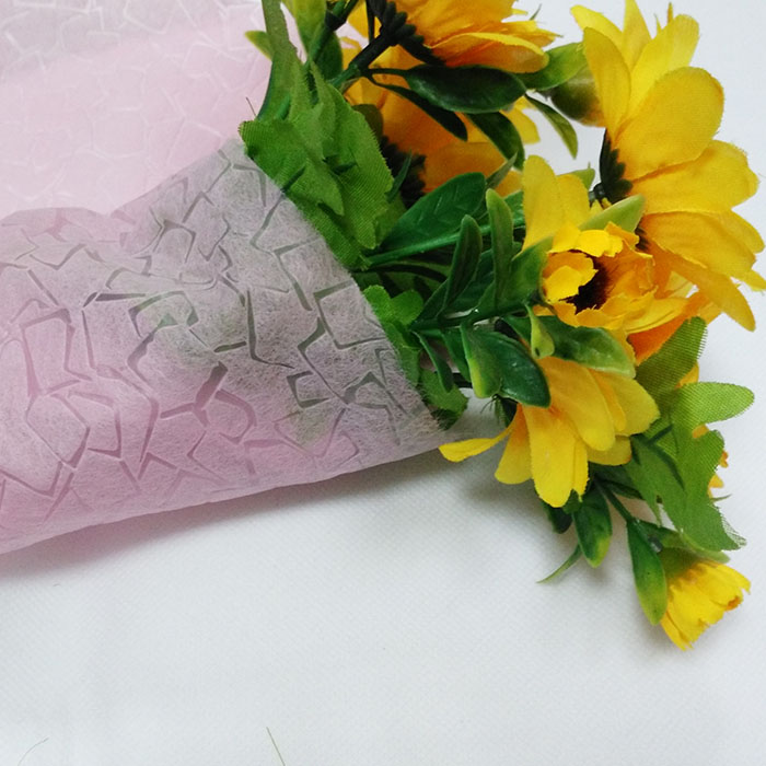 Non-woven tissue floral wraps
