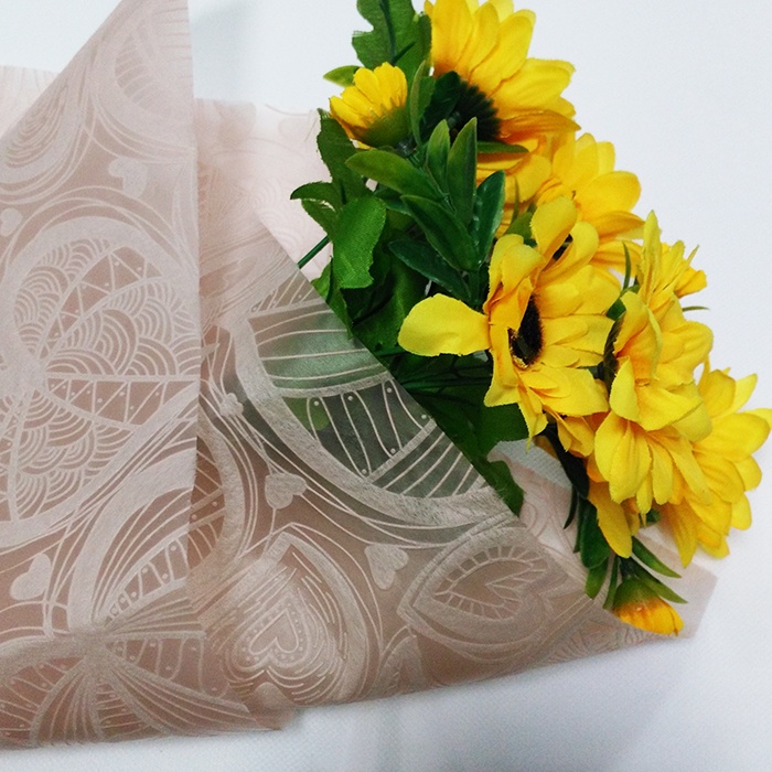 Floral packaging nonwoven material