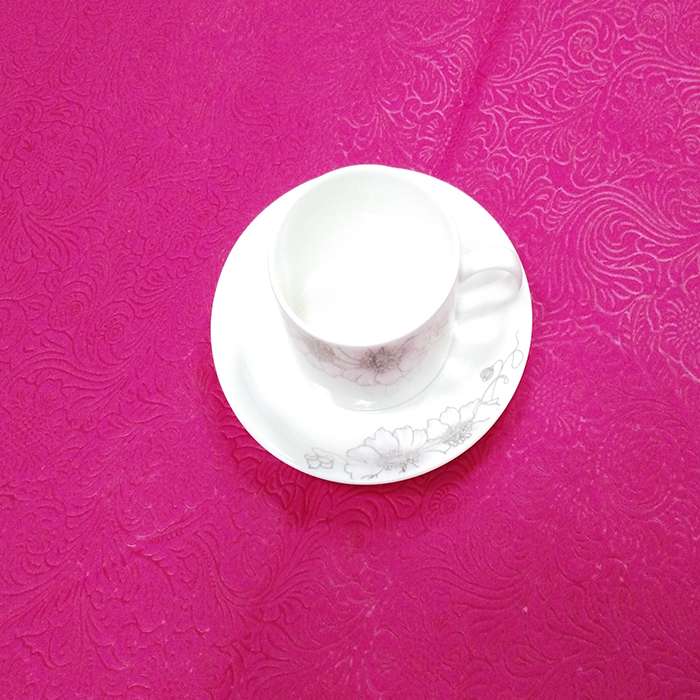 Disposable table cover nonwoven